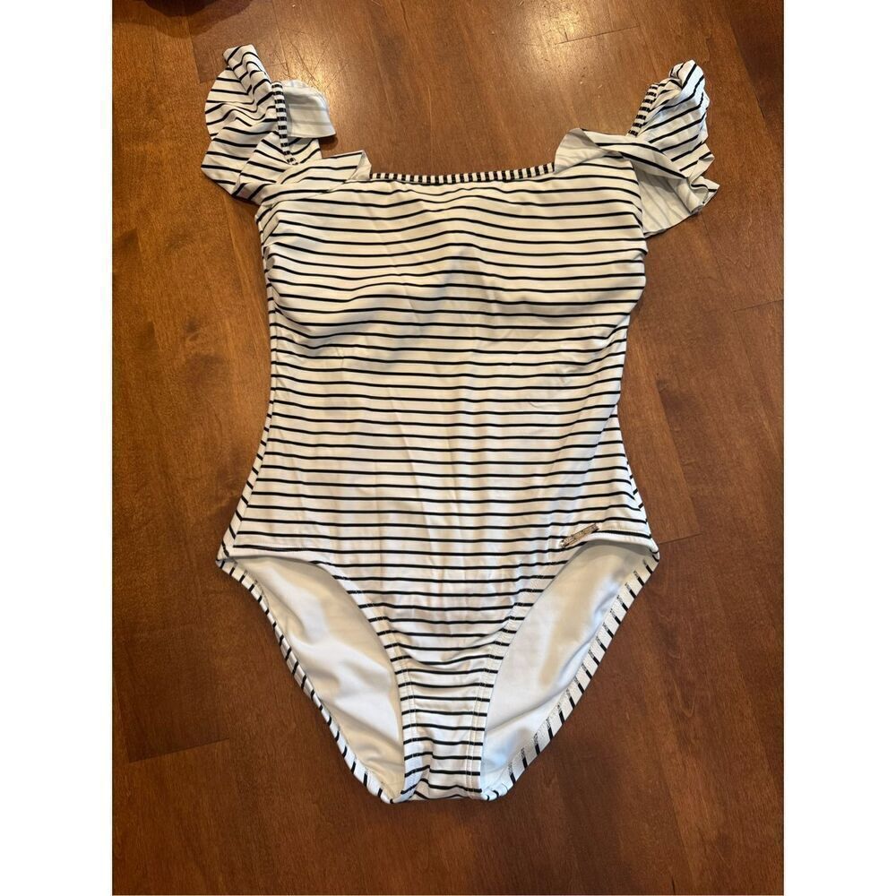 Woman’s Vince Camuto striped swimsuit size 6